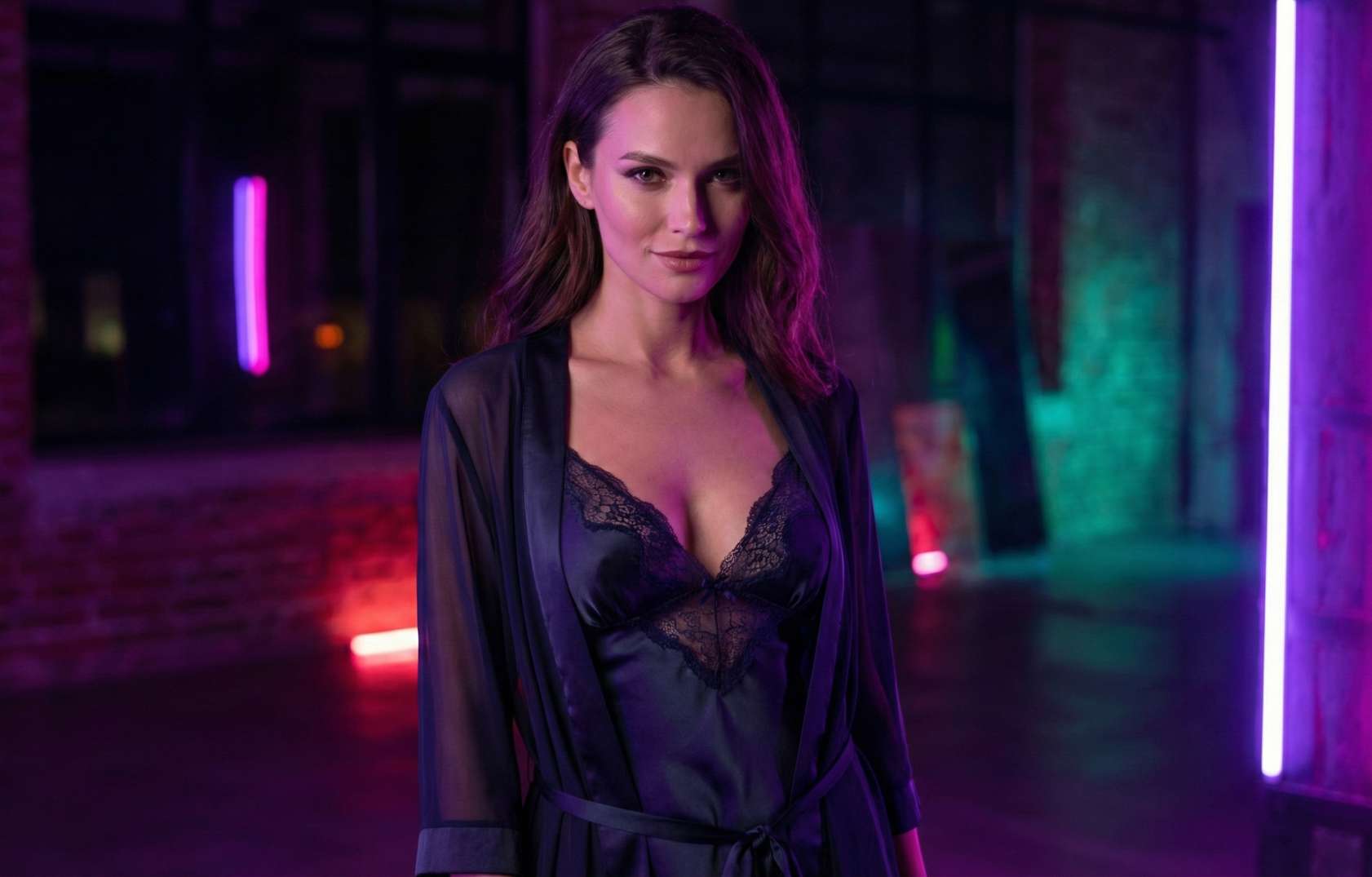 Seductive, high-fashion portrait of an elegant model in tasteful premium lingerie, bathed in moody neon purple and magenta studio lighting, looking confidently at the camera.